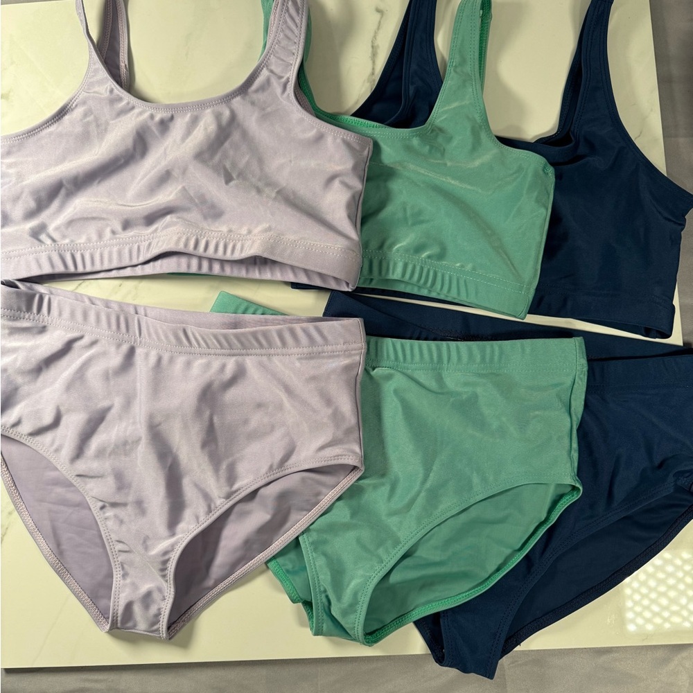 Comfortable Women's Sports Bras in Lavender, Teal, and Navy